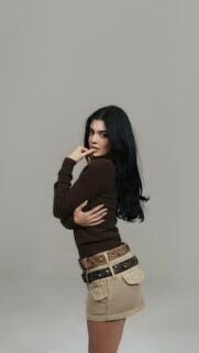 Kylie Jenner Fashion Portrait Minimalist Brown Aesthetic Wallpaper for Mobile