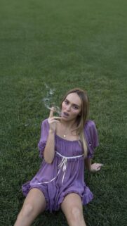 Lily Rose Depp Purple Dress Aesthetic Wallpaper for Mobile