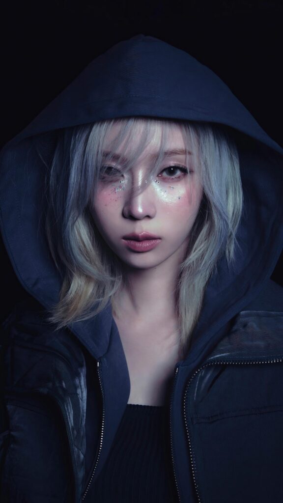 Mysterious Girl with Silver Hair in Dark Hoodie Aesthetic Wallpaper