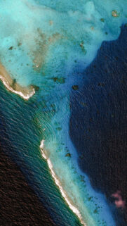 Breathtaking Aerial View of Tropical Ocean Coral Reef Wallpaper