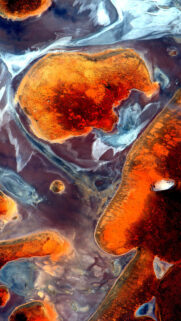 Abstract Aerial View of Vibrant Martian Desert Landscape Wallpaper