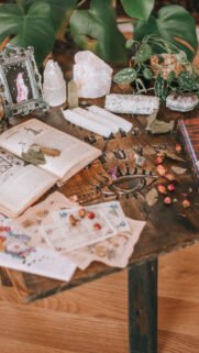 Sacred Manifestation Altar with Healing Crystals and Mystical Symbols Wallpaper