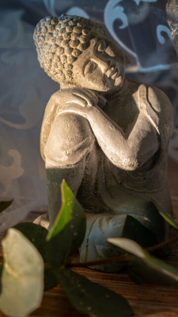 Zen Meditation Buddha Statue for Inner Peace and Mindfulness Wallpaper