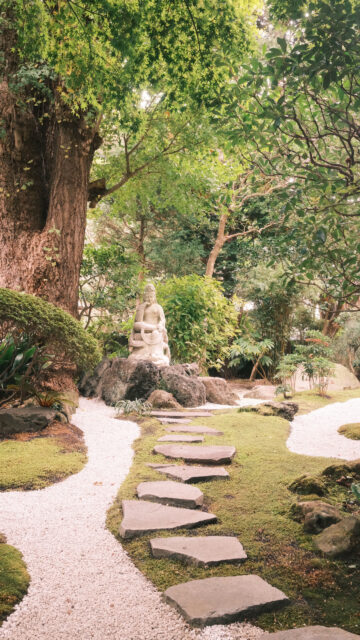 Serene Zen Meditation Garden Buddha Statue Spiritual Energy Wallpaper