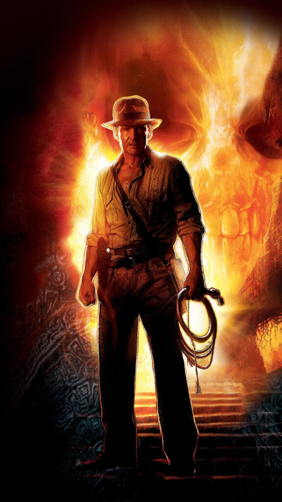 Indiana Jones Silhouette Standing Before a Fiery Skull Mobile Wallpaper