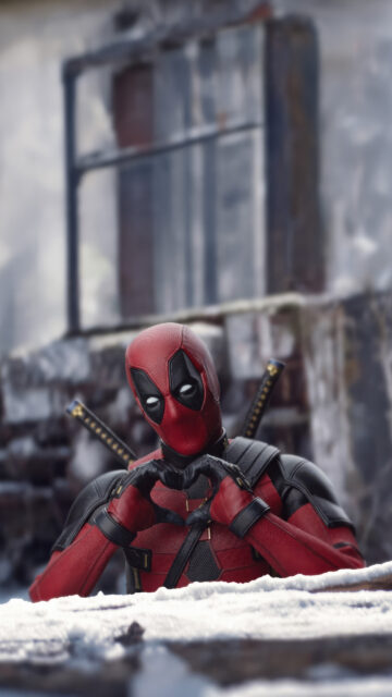 Deadpool Making a Heart Gesture with Snowy Background Mobile Wallpaper