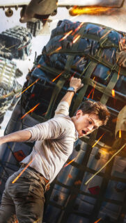 Tom Holland Action Scene Uncharted Mobile Wallpaper