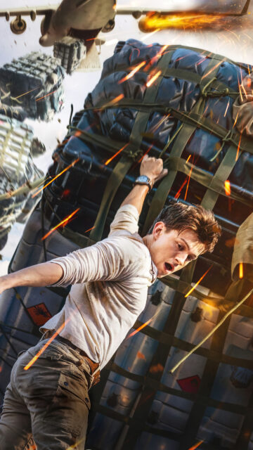 Tom Holland Action Scene Uncharted Mobile Wallpaper
