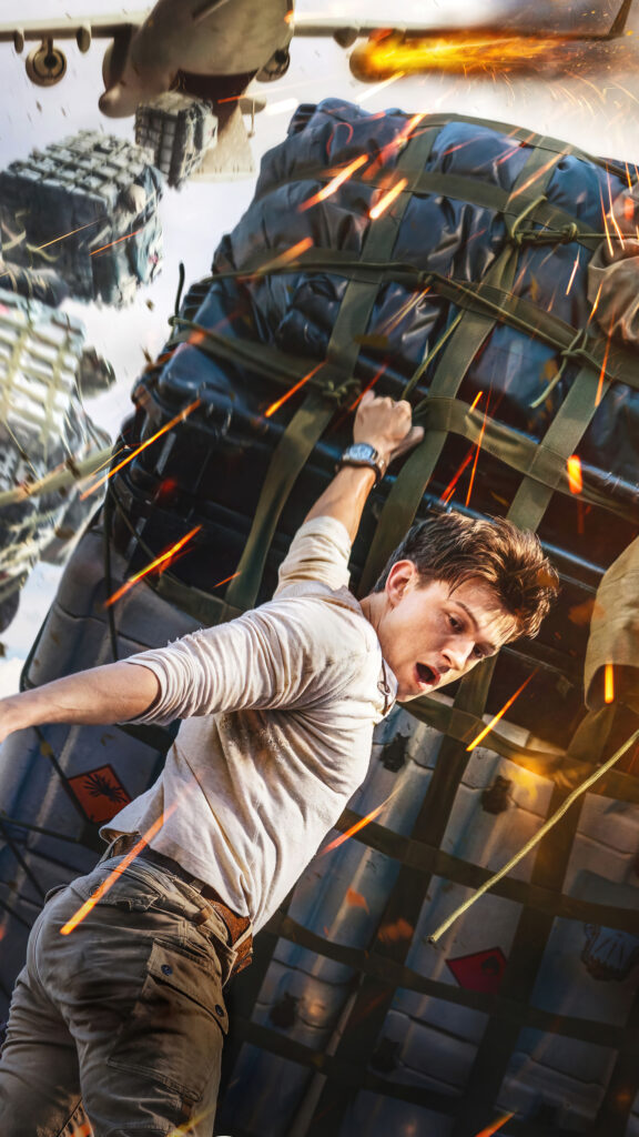 Tom Holland Action Scene Uncharted Mobile Wallpaper
