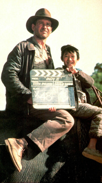 Harrison Ford and Ke Huy Quan Film Set Mobile Wallpaper