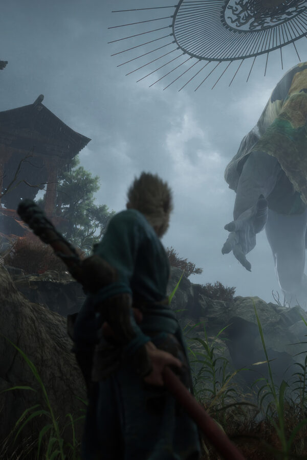 Sun Wukong Standing Against a Colossal Giant Mobile Wallpaper