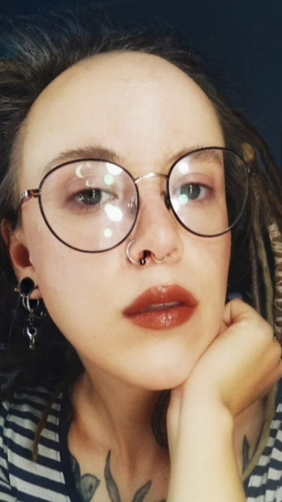 Woman with Dreadlocks and Glasses Mobile Wallpaper