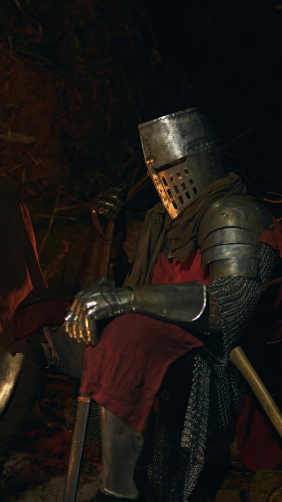 Epic Medieval Knight Sitting by Firelight Mobile Wallpaper