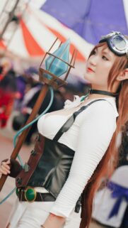 Steampunk Mage Cosplayer with Blue Crystal Staff Mobile Wallpaper