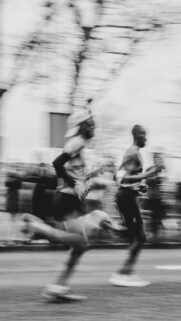 Blurred Marathon Runners in Motion High-Resolution Phone Wallpaper