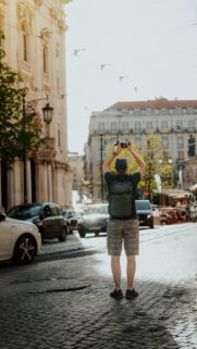 Photographer Exploring Lisbon Streets Mobile Phone Wallpaper