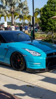 Vibrant Teal Nissan GT-R R35 Sport Car Mobile Phone Wallpaper