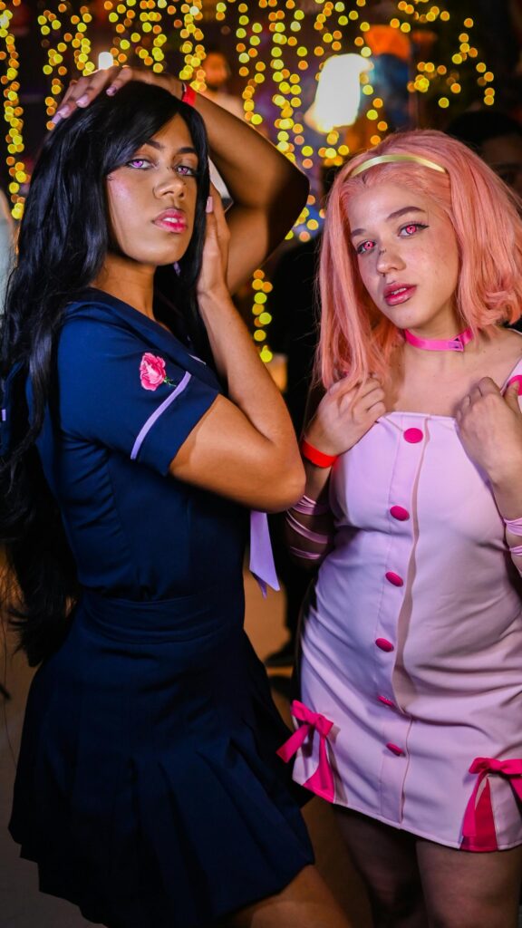 Stunning Anime Cosplay Duo Portrait Mobile Wallpaper