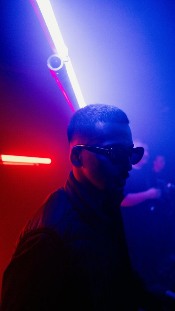 Stylish Man in Sunglasses Nightclub Neon Light Mobile Wallpaper