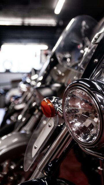 Classic Chrome Motorcycle Headlight Close-Up Phone Wallpaper