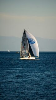 Professional Sailing Yacht on Deep Blue Ocean High Resolution Wallpaper