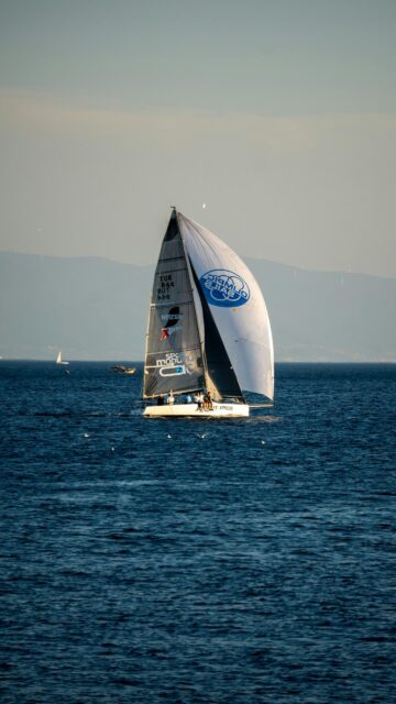 Professional Sailing Yacht on Deep Blue Ocean High Resolution Wallpaper