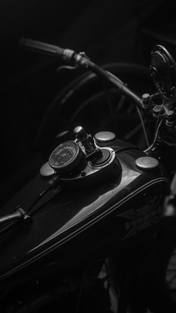 Vintage Excelsior Super X Motorcycle Fuel Tank and Speedometer Wallpaper