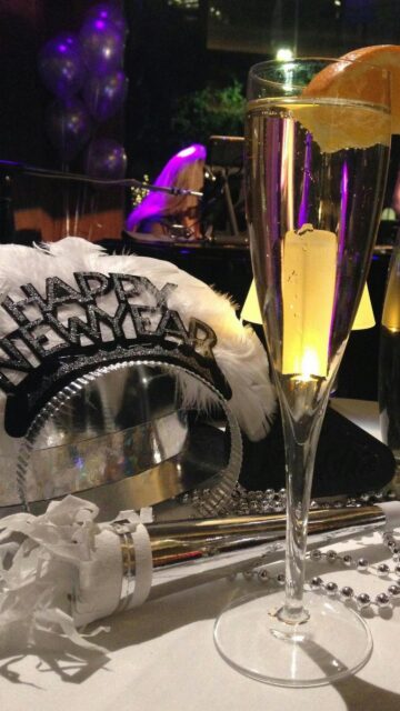 Elegant New Year Celebration Champagne and Party Decor Wallpaper