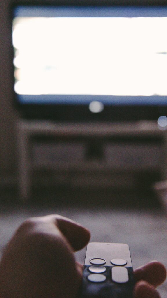Cozy Night In Watching TV Mobile Phone Wallpaper