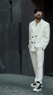 Stylish Man in White Suit and Designer Sunglasses Mobile Wallpaper