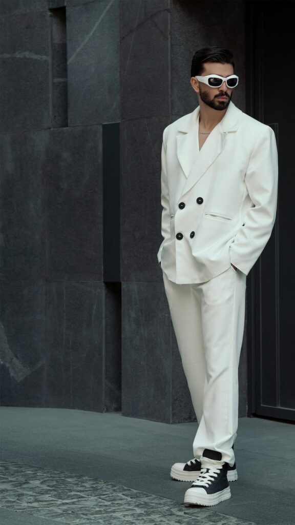 Stylish Man in White Suit and Designer Sunglasses Mobile Wallpaper