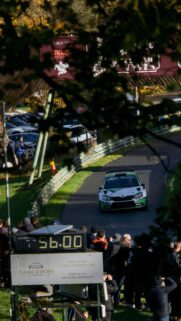 Skoda Rally Car Racing Through Forest Circuit Mobile Wallpaper