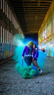 Joker and Harley Quinn Cosplay Couple in Graffiti Tunnel Wallpaper