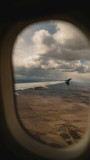 Stunning Aerial View from Airplane Window Cloudy Sky Mobile Wallpaper