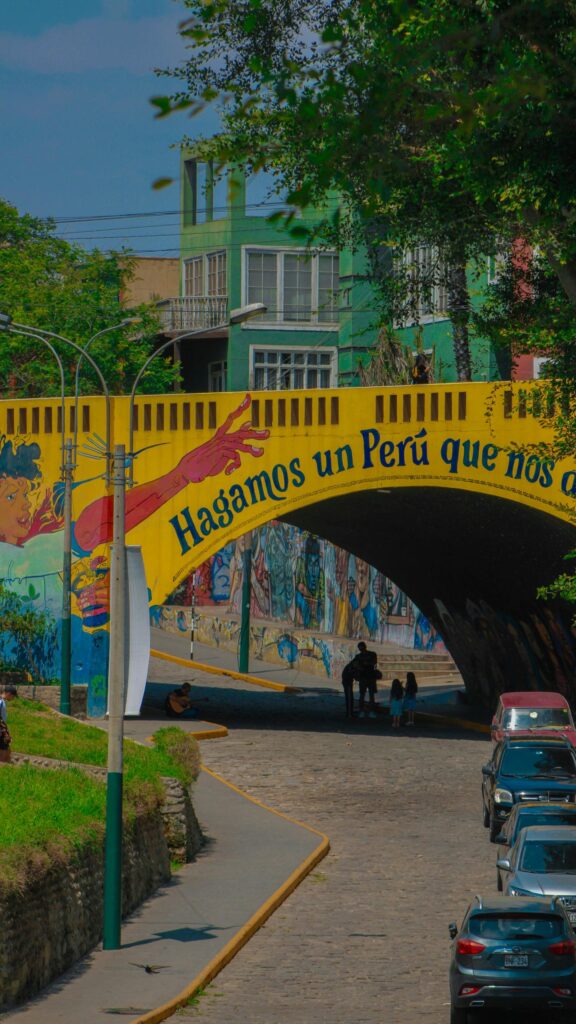 Vibrant Peruvian Street Art Bridge Urban Scene 4K Mobile Wallpaper