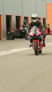 Professional Superbike Rider on Track Circuit Mobile Wallpaper