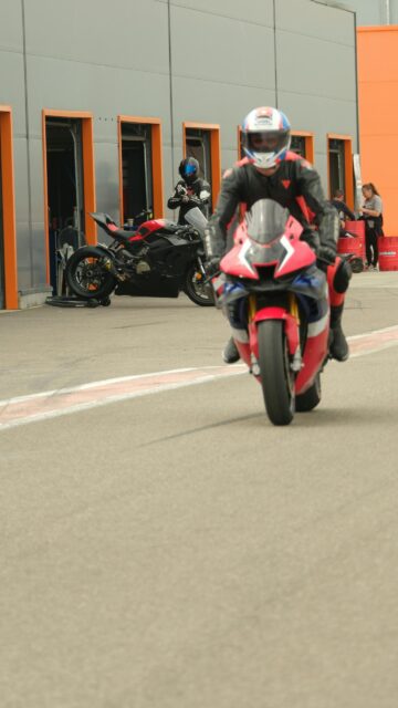Professional Superbike Rider on Track Circuit Mobile Wallpaper