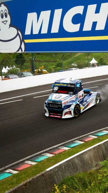 High-Speed Truck Racing Action Track Wallpaper