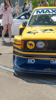 Yellow and Blue Racing Car Front Close-up Mobile Wallpaper