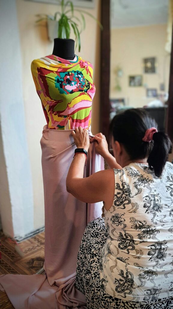 Tailor Working on Custom Dress Design Fashion Mobile Wallpaper
