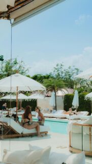 Luxury Poolside Relaxation with Friends Summer Vibes Mobile Wallpaper