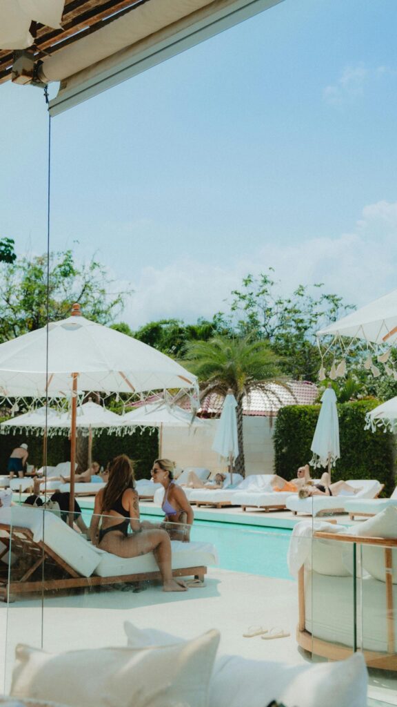 Luxury Poolside Relaxation with Friends Summer Vibes Mobile Wallpaper