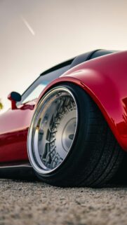 Low Stance Red Sports Car Deep Dish Rim Close Up Mobile Wallpaper