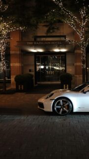 White Porsche 911 Carrera at The Hazelton Hotel Luxury Night Wallpaper