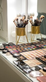 Professional Makeup Vanity Desk with Cosmetic Palettes Mobile Wallpaper