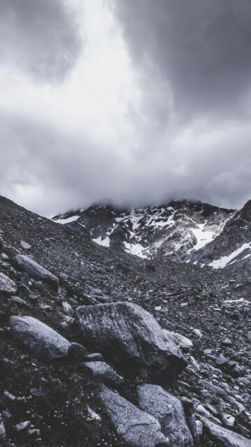 Dramatic Stormy Mountain Peaks and Rocky Alpine Scenery Phone Wallpaper