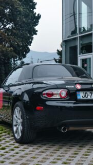 Black Mazda MX-5 Miata Rear View Luxury Car Phone Wallpaper