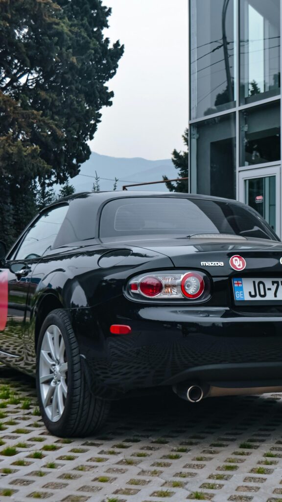 Black Mazda MX-5 Miata Rear View Luxury Car Phone Wallpaper