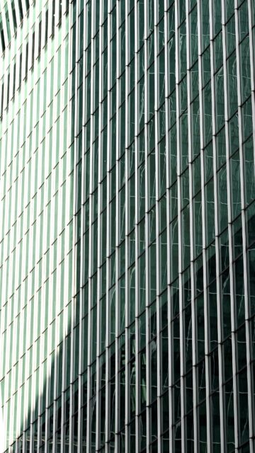 Modern Architectural Glass Skyscraper Geometric Facade Wallpaper