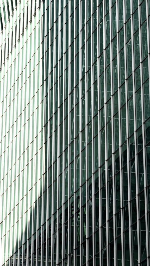 Modern Architectural Glass Skyscraper Geometric Facade Wallpaper